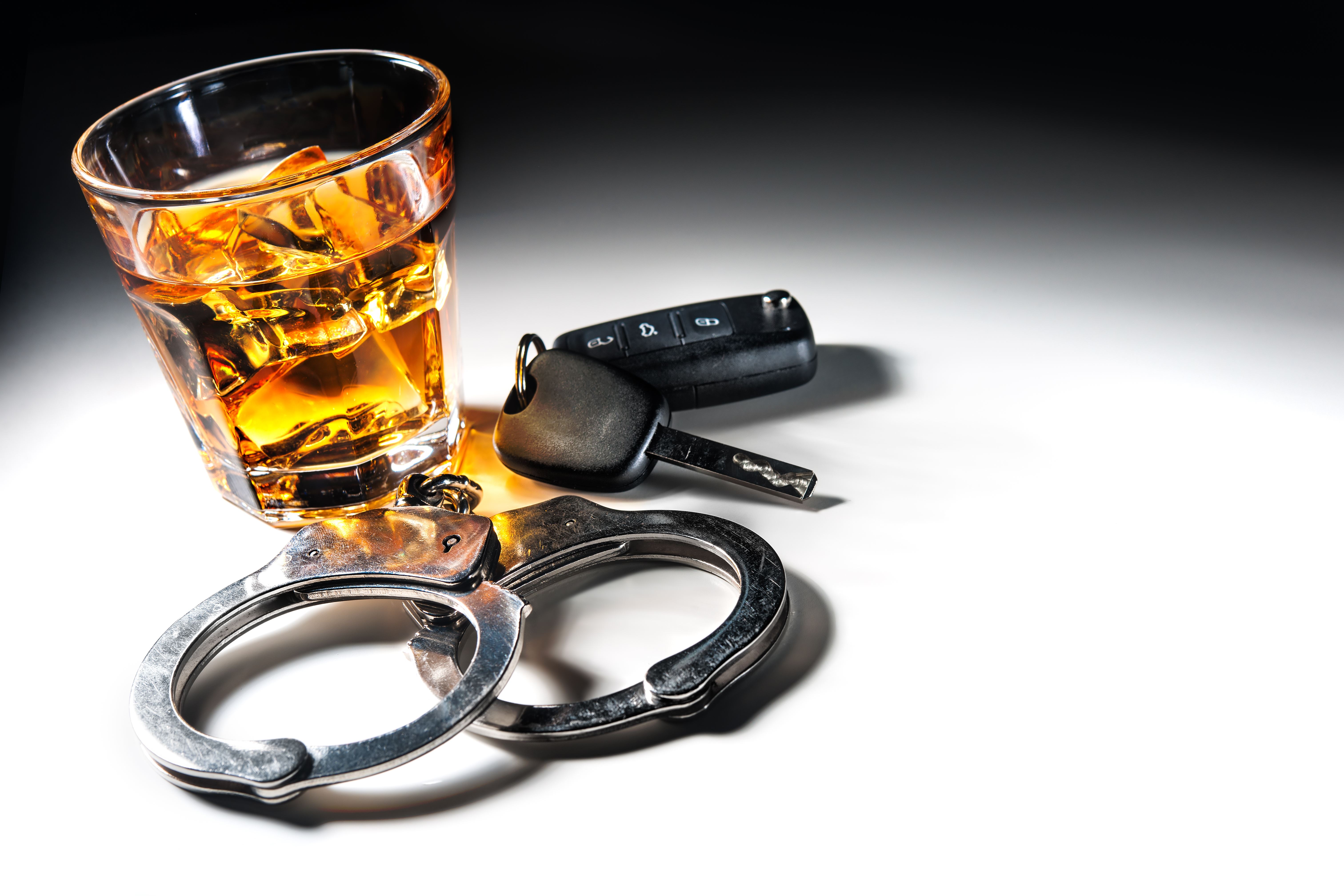 Alcohol, handcuffs and car keys - Need an Alaska DUI attorney?